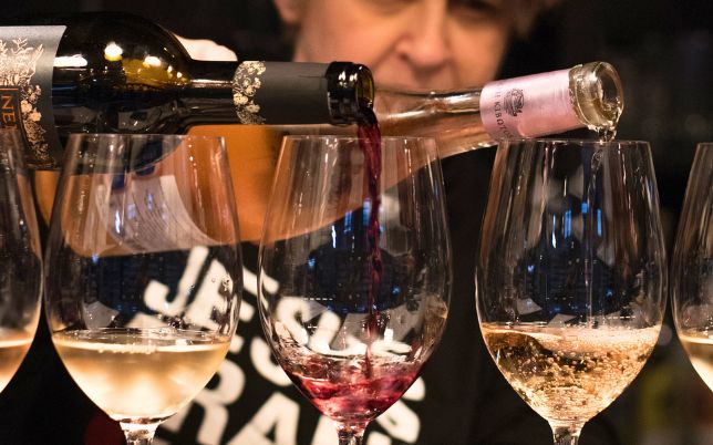 Greek wine varieties poured into tasting glasses during a wine tasting in Athens